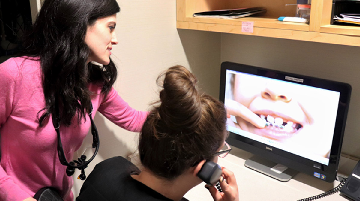 Dental professionals doing a virtual consultation